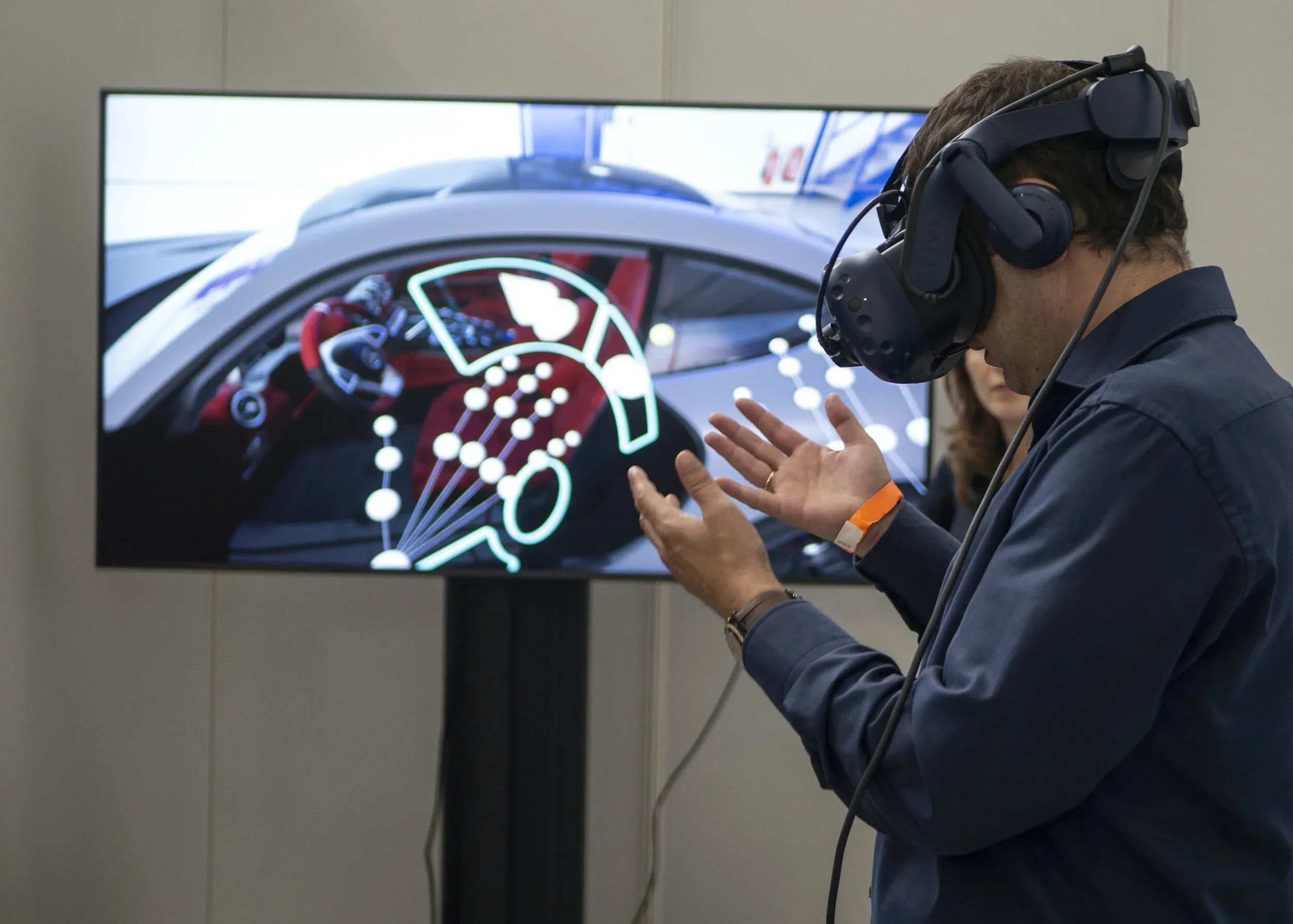 Person wearing a VR headset in an immersive XR experience